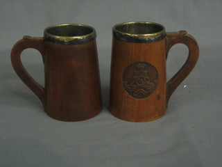 A pair of Eastern carved wooden tankards decorated the badge of the Royal Artillery