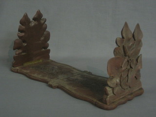 A pair of wooden expanding book ends (f)