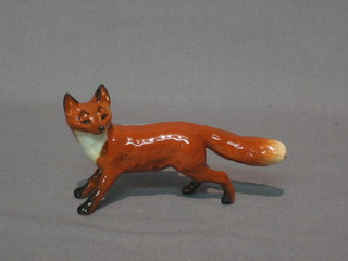 A Beswick figure of a fox 4"