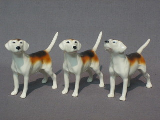 3 various Beswick figures of fox hounds 4"
