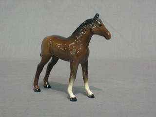 A Royal Doulton figure of a standing bay foal 5"