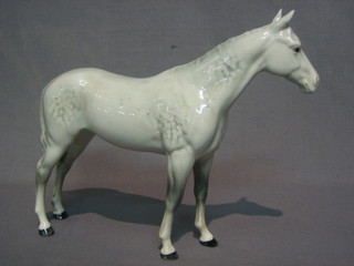 A Beswick figure of a standing dapple grey horse 6"