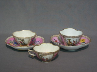 A  19th Century Meissen style cabinet cup and saucer  with  pink ground  and  panel decoration with flowers and figures,  the  base with crossed swords mark together with 2 other cups and 1 saucer (f)