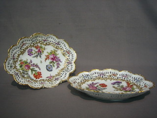 A  handsome  pair of 19th/20th Century  "Meissen"  oval  ribbon work dishes with floral decoration, the bases with crossed swords and marked EC 9"