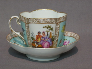 A  Continental  porcelain cabinet cup and  saucer  with  turquoise and gilt panels decorated romantic scenes