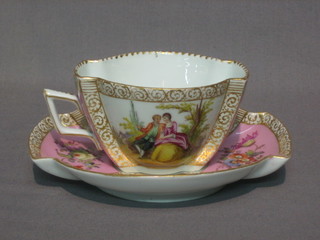 A late Dresden boat shaped porcelain cabinet cup and saucer with puce panels decorated romantic scenes, the base marked  Dresden and impressed 187