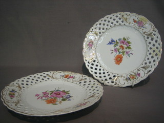 A  pair of 19th Century porcelain ribbon ware plates  with  floral decoration, the reverse marked 162D/65 9"
