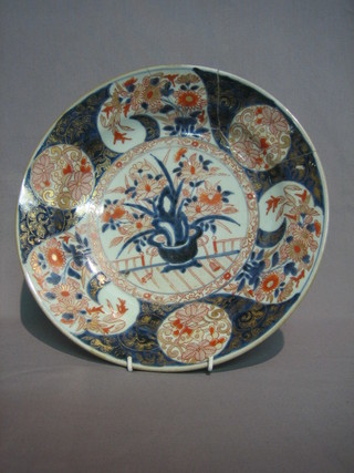 A 19th Century Imari porcelain bowl, the centre decorated a vase of flowers within floral borders 13" (f and r)