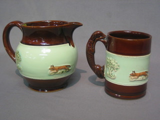 A  Bourne  Denby pottery jug decorated hunting scene  and  with matching tankard