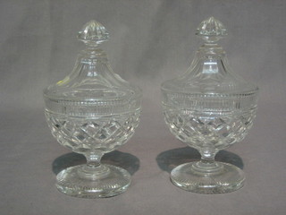 A  pair  of circular Irish cut glass sweet meat jars and  covers  7"
