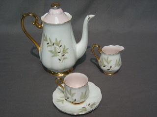 A   15   piece   Royal  Albert  Braemar   pattern   coffee   service comprising  coffee pot (chip to rim), sugar bowl (f and r),  cream  jug, 6 cups and 6 saucers, together with a miniature Oriental vase 4"