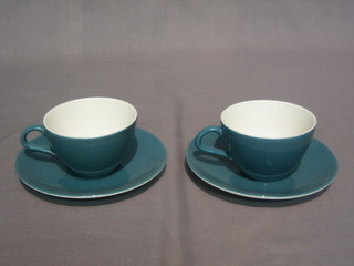 A  blue  glazed Poole Pottery 12 piece tea  service  comprising  4 bowls 6", 4 cups and 4 saucers