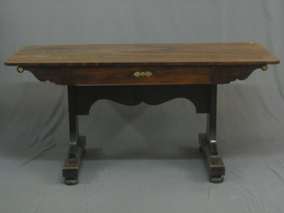 A  William  IV rectangular rosewood library table fitted  a  frieze drawer, raised on standard end supports, 59"
