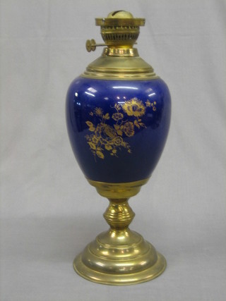 A  Continental blue glazed porcelain oil lamp of ovoid form  with gilt metal mounts 19" 
