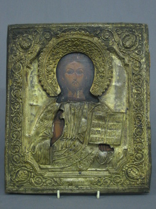 An  Eastern Icon of a standing figure with open book, on  an  oak panel   with   embossed   "silver"  mounts  12"   x   10"  