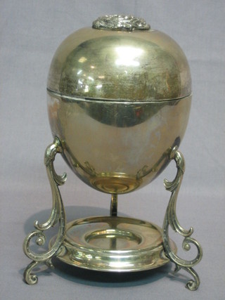 An oval silver plated egg boiler (burner missing)