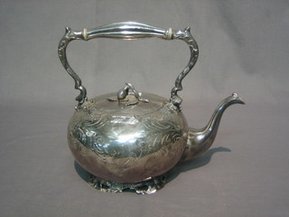 A Victorian engraved Britannia metal tea kettle