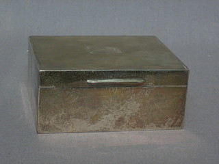An  Art  Deco  square  silver cigarette  case  with  engine  turned decoration and hinged lid, London 1933 4"