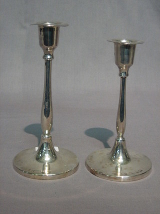 A pair of South African silver plated candlesticks  7"