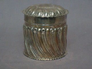 A   Victorian  embossed  cylindrical  silver  dressing   table   jar, London 1896 4 ozs