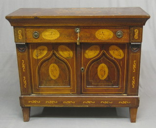 An 18th Century Dutch inlaid marquetry chiffonier, the top inlaid a   basket  of  flowers  above  1  long  drawer  above  a  pair   of cupboards  inlaid  sea  shells, enclosed by  arch  shaped  panelled doors and raised on square supports 41"