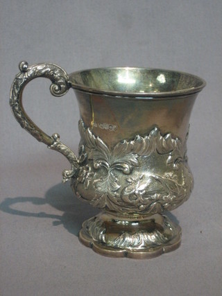 A handsome William IV embossed silver tankard of baluster form London 1837 5 ozs 