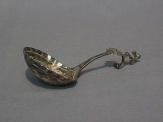 An embossed Dutch silver caddy spoon