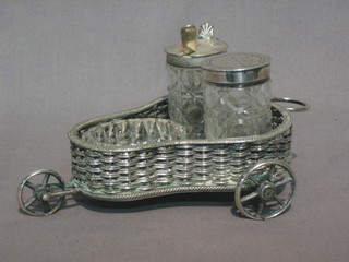 A  19th  Century  silver plated 3 bottle cruet in the  form  of  a  3 wheeled chariot