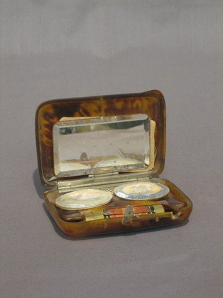 A lady's 1930's rectangular tortoiseshell necessaire fitted 2 rouge pots, manicure implements etc, 3"