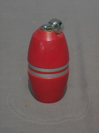 A Poppell table lighter in the form of a red barrel, boxed