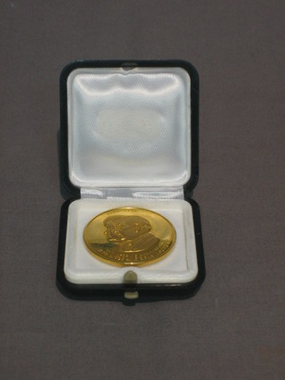 A  Greek  gilt  metal  bronze to  commemorate  a  50th  Wedding Anniversary