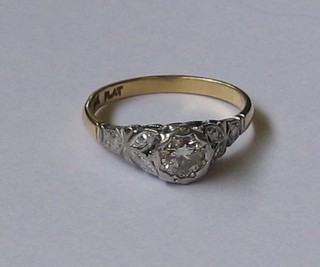 A lady's 9ct gold dress ring set a single diamond