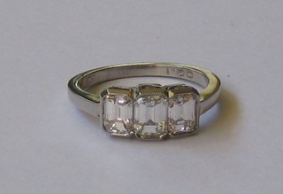 A lady's 18ct white gold engagement ring set 3 rectangular cut diamonds (approx 1.50ct)