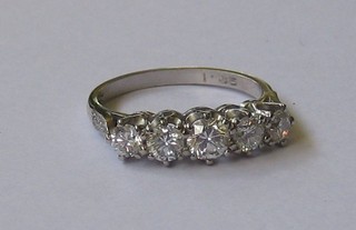 A lady's 18ct white gold engagement ring set 5 diamonds with 6 diamonds to the shoulders (approx 1.41ct)