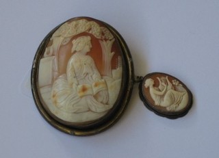 A shell carved cameo pendant together with a do. brooch