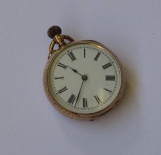 An open faced fob watch contained in a 14ct chased gold case