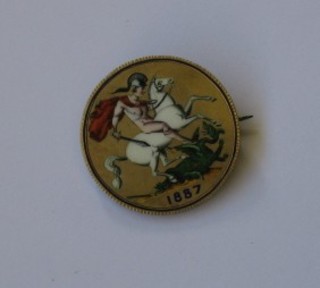 A Victorian 1887 enamelled coin brooch