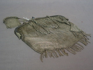 A chain mail evening bag and a chain mail purse