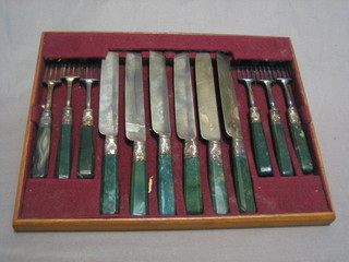 A set of 6 silver plated fruit knives with carved "malachite" handles