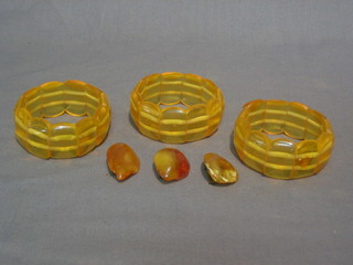 3 amber bracelets and 3 amber brooches