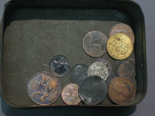 A Victorian farthing and other copper coins