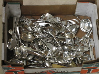 A collection of various silver plated flatware