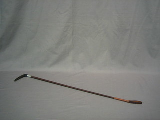 A riding crop with silver band and horn handle (handle f) by Swaynes