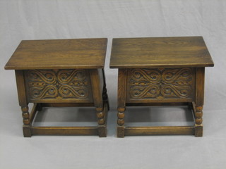 A pair of oak stools with hinged lids and carved panelled decoration, raised on turned and block supports 20" 