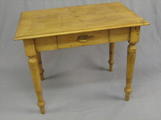 A Continental pine side table fitted a drawer and raised on turned supports 38"