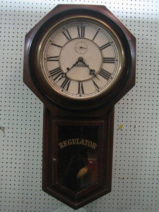 An Ansonia regulator, the 11 1/2" paper dial with minute indicator contained in a mahogany case