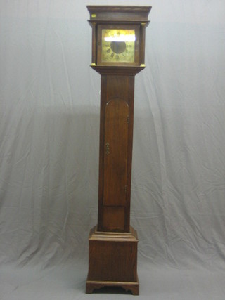 An 18th Century style 8 day longcase clock, the 8" square brass dial with Roman numerals contained in an oak case complete with weights and pendulum 72"