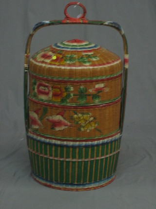 A Singapore basket ware 4 tier cylindrical wedding basket