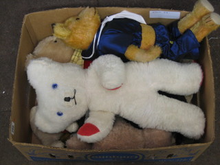 A Rupert Bear, 2 reproduction porcelain dolls, various teddy bears etc