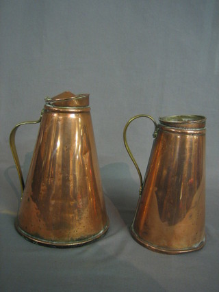 A pair of 19th Century waisted copper jugs with porcelain inserts 10" (1 without lid and 1 missing finial)